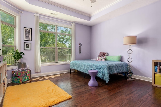 4881 Primrose Ct, Grove City, OH 43123 - bedroom featuring wood-type flooring, ornamental molding, a raised ceiling, multiple windows, and ceiling fan