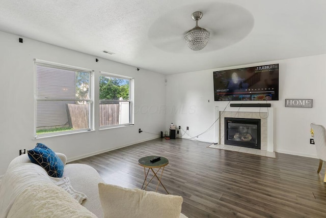 3151 Crossgate Rd, Columbus, OH 43232 - living room with a ceiling fan, wood finished floors, and a fireplace
