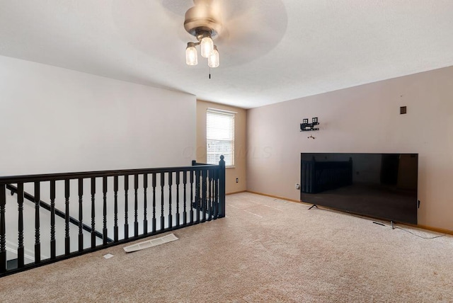 3151 Crossgate Rd, Columbus, OH 43232 - unfurnished living room with carpet floors and a ceiling fan