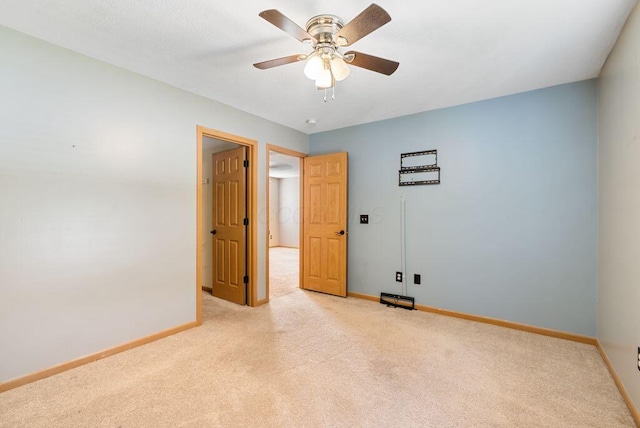 3151 Crossgate Rd, Columbus, OH 43232 - unfurnished bedroom with light colored carpet and a ceiling fan