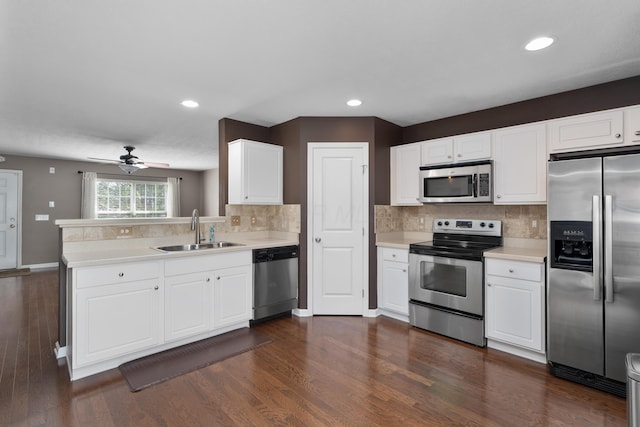 3839 Rubythroat Dr, Columbus, OH 43230 - kitchen with stainless steel appliances, light countertops, a peninsula, tasteful backsplash, and a ceiling fan