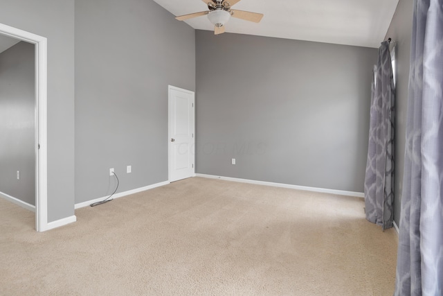 3839 Rubythroat Dr, Columbus, OH 43230 - carpeted empty room with ceiling fan and high vaulted ceiling
