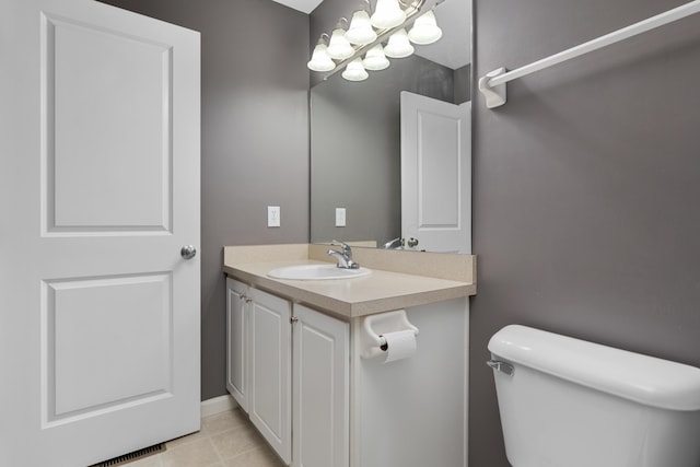 3839 Rubythroat Dr, Columbus, OH 43230 - bathroom featuring vanity, a chandelier, and tile patterned flooring