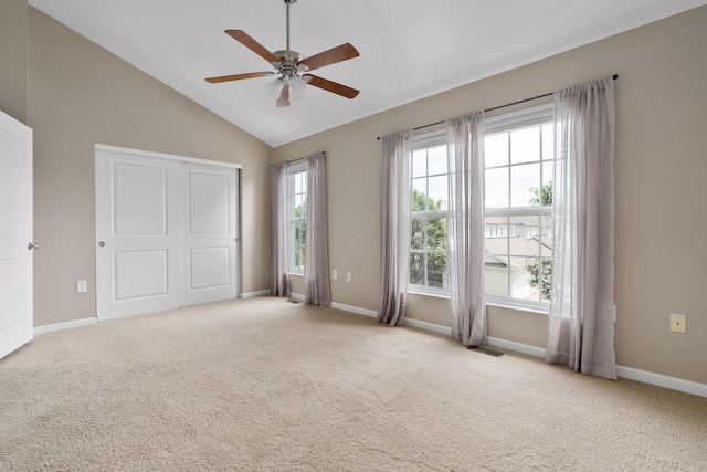 3839 Rubythroat Dr, Columbus, OH 43230 - unfurnished bedroom with carpet floors, lofted ceiling, a closet, and a ceiling fan