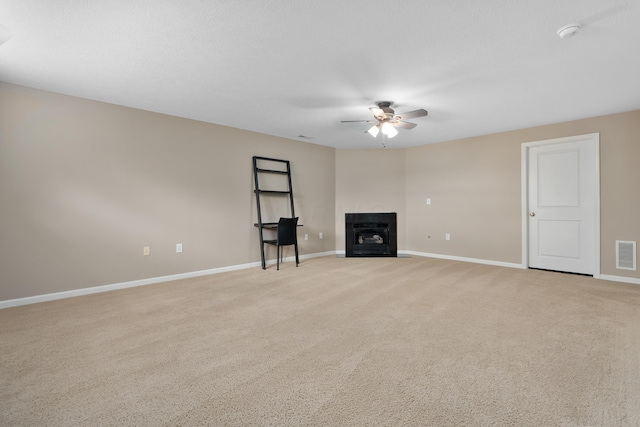 3839 Rubythroat Dr, Columbus, OH 43230 - unfurnished living room featuring ceiling fan, a fireplace, and light colored carpet