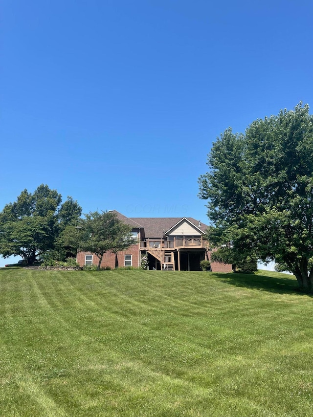 7616 Richardson Rd, Groveport, OH 43125 - view of grassy yard with a deck and stairs