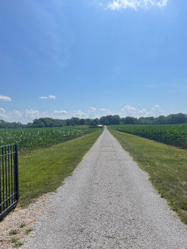 7616 Richardson Rd, Groveport, OH 43125 - view of street featuring a rural view, agricultural plots, and a gated entry