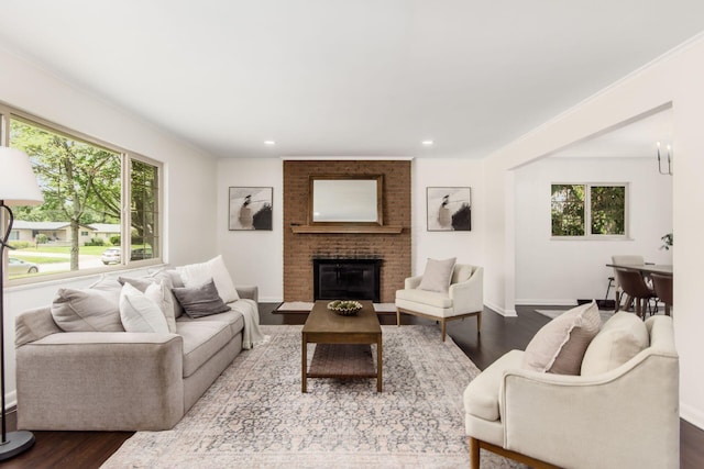 2664 Sonata Dr, Columbus, OH 43209 - living room with wood finished floors, a fireplace, and recessed lighting