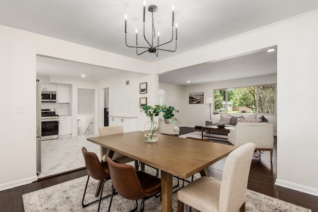 2664 Sonata Dr, Columbus, OH 43209 - dining room with a chandelier, dark wood-style floors, and recessed lighting