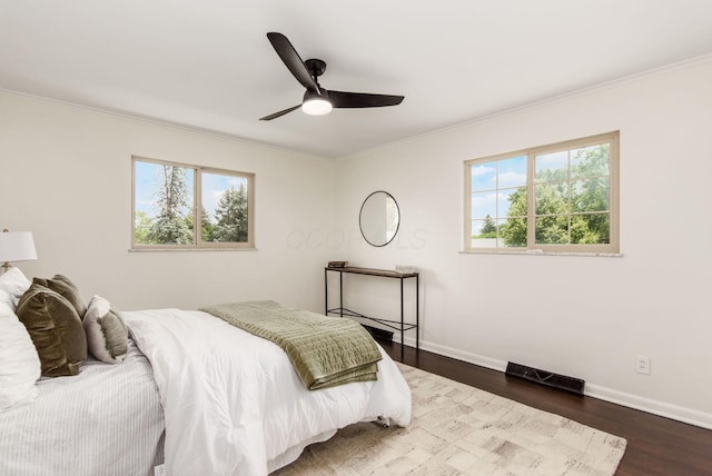 2664 Sonata Dr, Columbus, OH 43209 - bedroom with ornamental molding, dark wood-type flooring, and ceiling fan