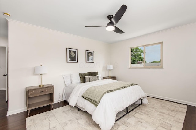 2664 Sonata Dr, Columbus, OH 43209 - bedroom with crown molding, wood finished floors, and a ceiling fan