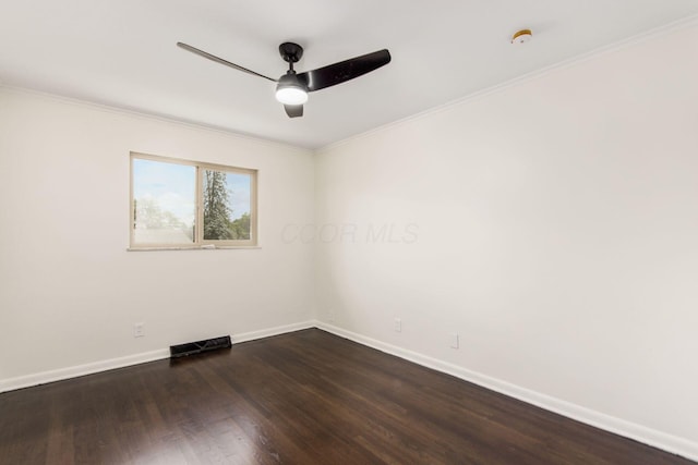 2664 Sonata Dr, Columbus, OH 43209 - unfurnished room with ceiling fan, dark wood-style flooring, ornamental molding, and a smoke detector