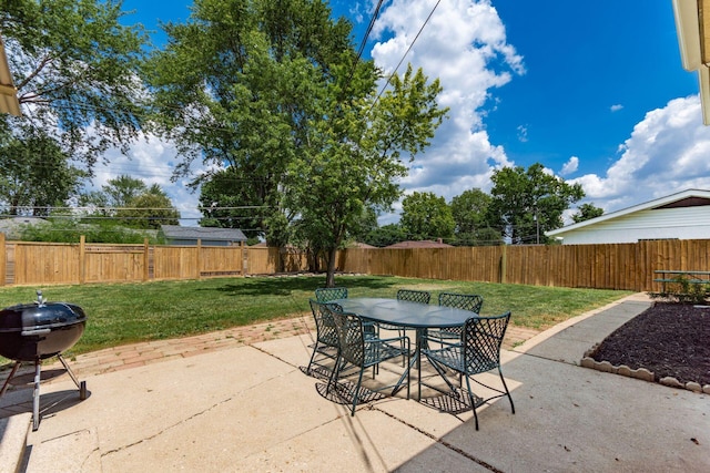 2664 Sonata Dr, Columbus, OH 43209 - fenced backyard featuring a patio area, outdoor dining space, and area for grilling