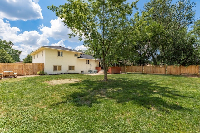 2664 Sonata Dr, Columbus, OH 43209 - fenced backyard featuring a patio area