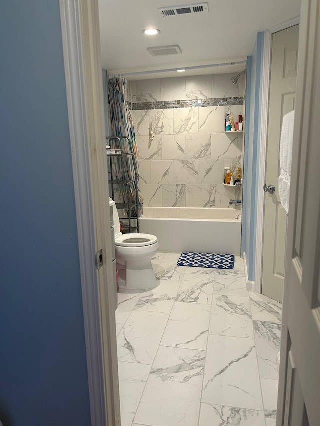 5479 Worthington Forest Pl, Columbus, OH 43229 - bathroom featuring shower / tub combination and marble finish flooring