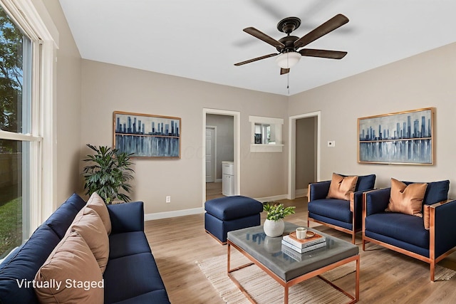 3189 E 6th Ave, Columbus, OH 43219 - living room with a ceiling fan and wood finished floors