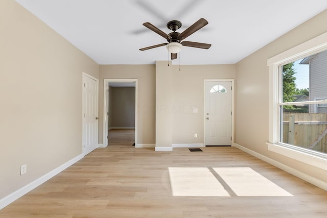 3189 E 6th Ave, Columbus, OH 43219 - entrance foyer with light wood finished floors and ceiling fan