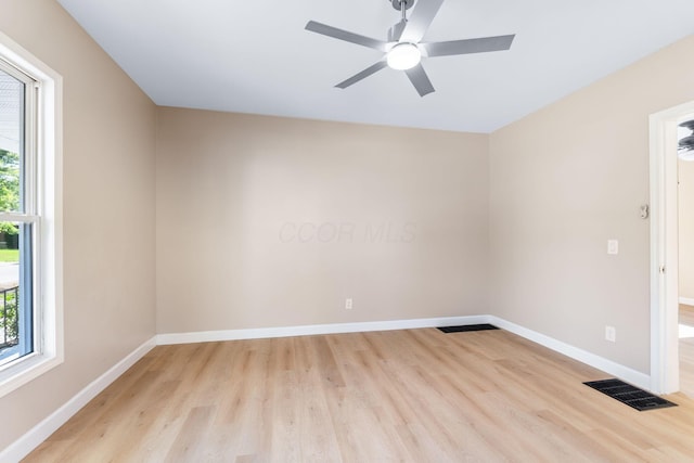 3189 E 6th Ave, Columbus, OH 43219 - spare room featuring light wood-type flooring and a ceiling fan