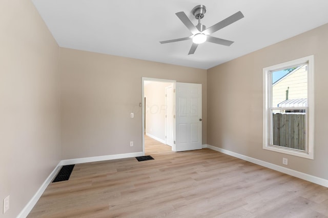 3189 E 6th Ave, Columbus, OH 43219 - unfurnished bedroom featuring light wood finished floors and a ceiling fan