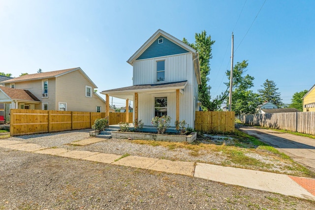 3189 E 6th Ave, Columbus, OH 43219 - view of front facade with a porch and board and batten siding