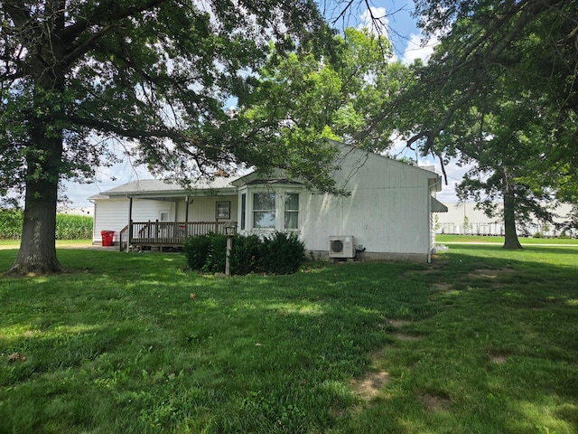7376 Mink St SW, Pataskala, OH 43062 - view of side of home with a lawn and a porch