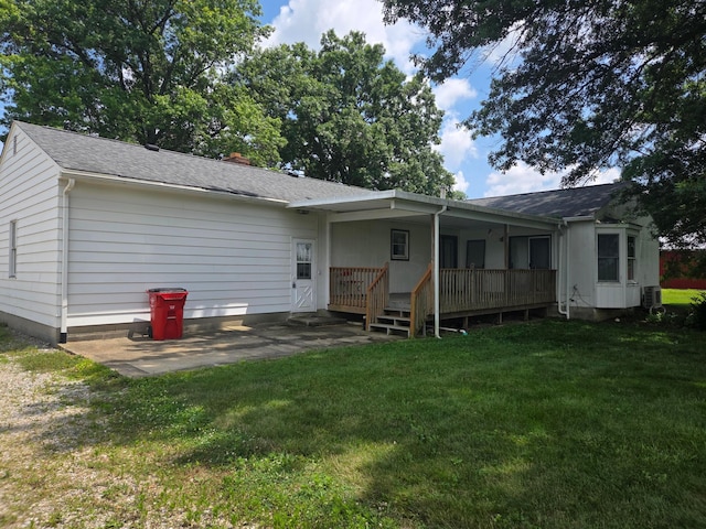 7376 Mink St SW, Pataskala, OH 43062 - rear view of property featuring a yard, covered porch, and a shingled roof