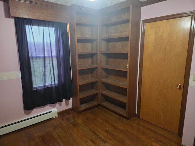 7376 Mink St SW, Pataskala, OH 43062 - unfurnished room featuring baseboard heating and wood finished floors