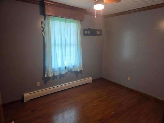 7376 Mink St SW, Pataskala, OH 43062 - empty room with a baseboard radiator, a ceiling fan, hardwood / wood-style floors, crown molding, and a textured ceiling