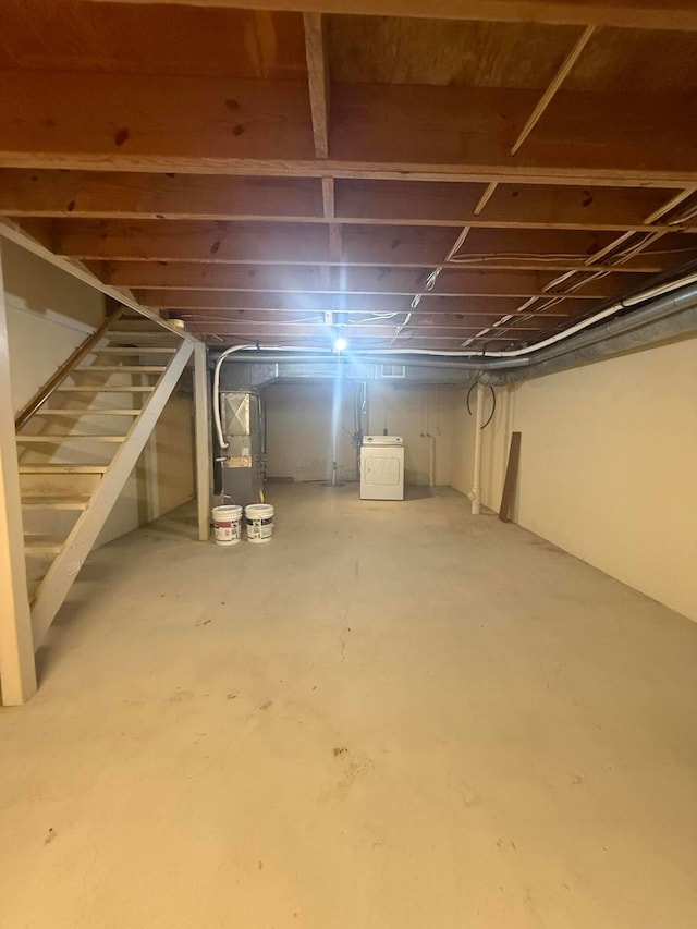 2022 Queensgate Ln, Columbus, OH 43235 - unfinished basement featuring stairway and washer / dryer