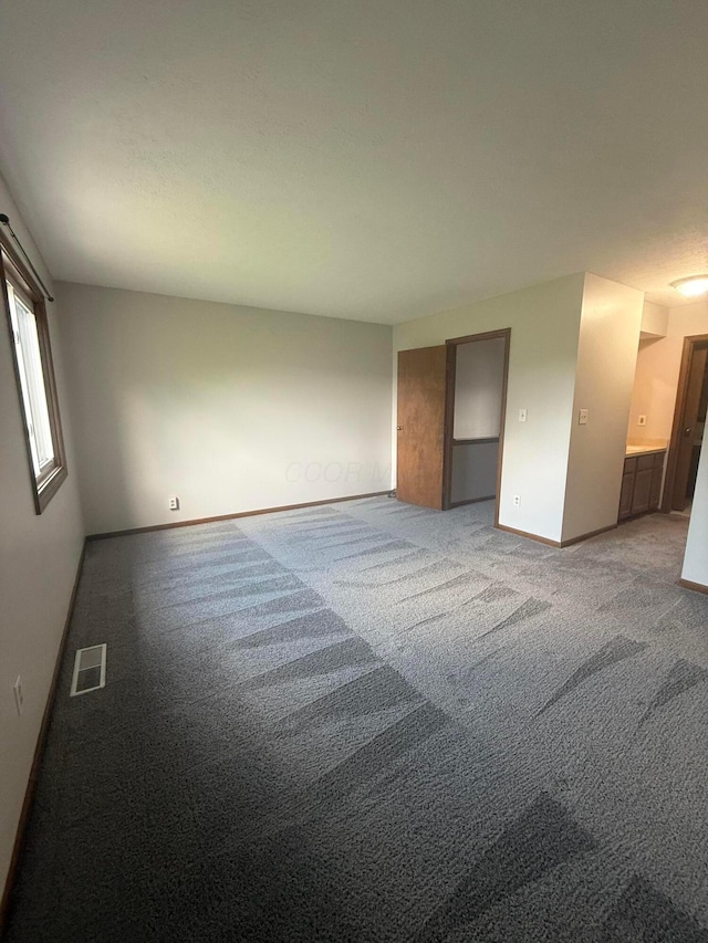 2022 Queensgate Ln, Columbus, OH 43235 - spare room with carpet and baseboards