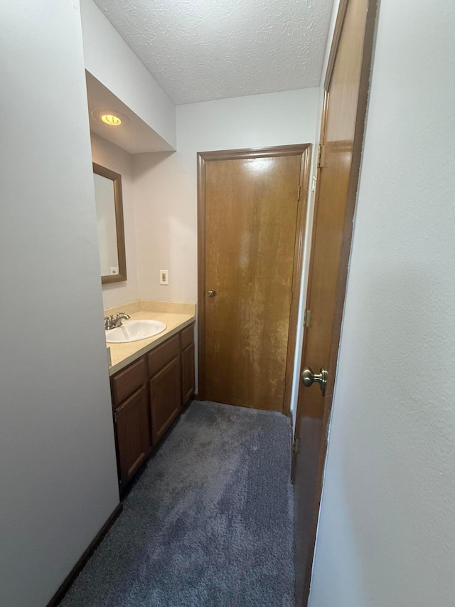 2022 Queensgate Ln, Columbus, OH 43235 - bathroom featuring vanity and a textured ceiling