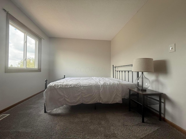2022 Queensgate Ln, Columbus, OH 43235 - carpeted bedroom featuring baseboards
