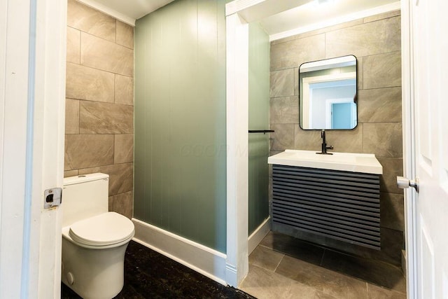 186 S Walnut St, Chillicothe, OH 45601 - bathroom featuring tile walls, vanity, and tile patterned floors