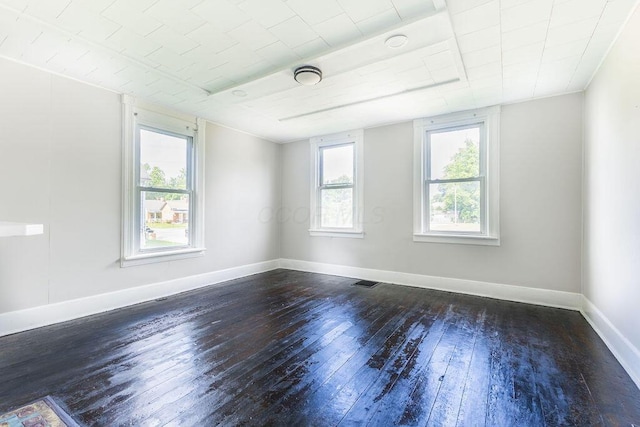 186 S Walnut St, Chillicothe, OH 45601 - spare room with dark wood-type flooring and baseboards
