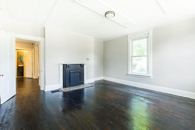 186 S Walnut St, Chillicothe, OH 45601 - unfurnished living room with dark wood-type flooring and a fireplace with flush hearth