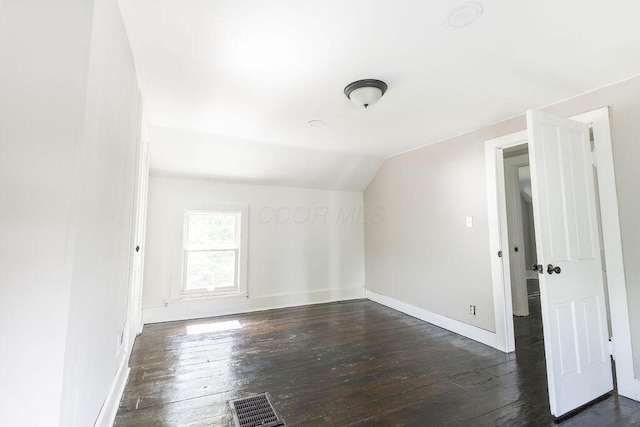 186 S Walnut St, Chillicothe, OH 45601 - additional living space with dark wood-style floors and vaulted ceiling