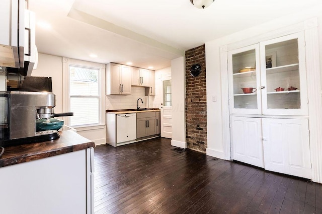 186 S Walnut St, Chillicothe, OH 45601 - kitchen featuring dishwasher, dark wood-style flooring, wooden counters, and tasteful backsplash