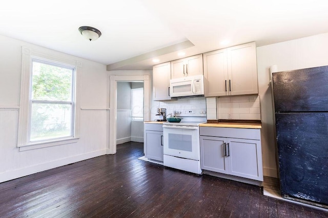 186 S Walnut St, Chillicothe, OH 45601 - kitchen featuring white appliances, dark wood-style flooring, decorative backsplash, and gray cabinetry