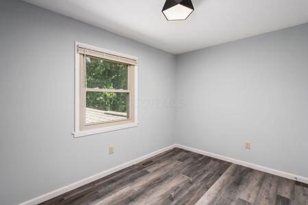 5200 Garmouth Ct, Columbus, OH 43221 - spare room featuring wood finished floors and baseboards