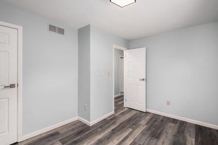 5200 Garmouth Ct, Columbus, OH 43221 - spare room featuring wood finished floors and baseboards