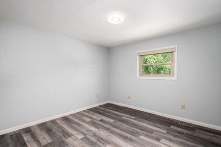 5200 Garmouth Ct, Columbus, OH 43221 - unfurnished room with baseboards and wood finished floors