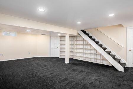 5200 Garmouth Ct, Columbus, OH 43221 - finished below grade area with carpet flooring, recessed lighting, and stairway
