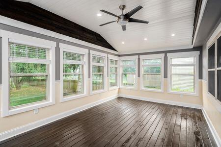 5200 Garmouth Ct, Columbus, OH 43221 - unfurnished sunroom with lofted ceiling and hardwood / wood-style floors