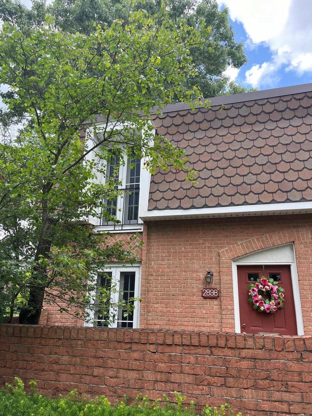 2898 Chateau Cir, Upper Arlington, OH 43221 - view of home's exterior with brick siding