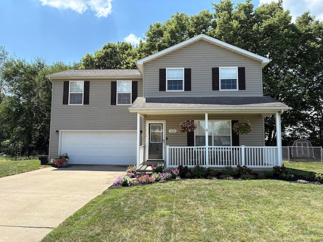 5030 Lee Rd, South Bloomfield, OH 43103 - traditional-style home featuring a garage, covered porch, and driveway