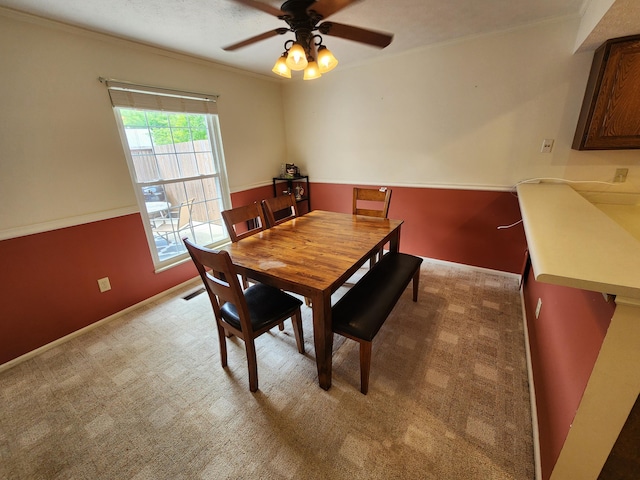 450 Williamsburg Ln Unit A, Lancaster, OH 43130 - dining room with light colored carpet, crown molding, and ceiling fan