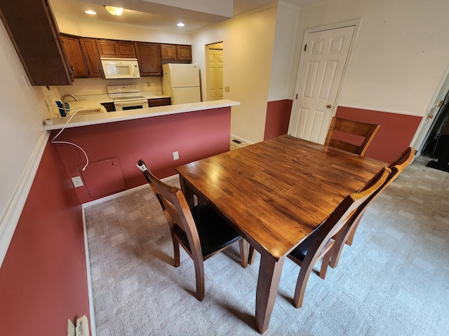 450 Williamsburg Ln Unit A, Lancaster, OH 43130 - dining space with light carpet and recessed lighting