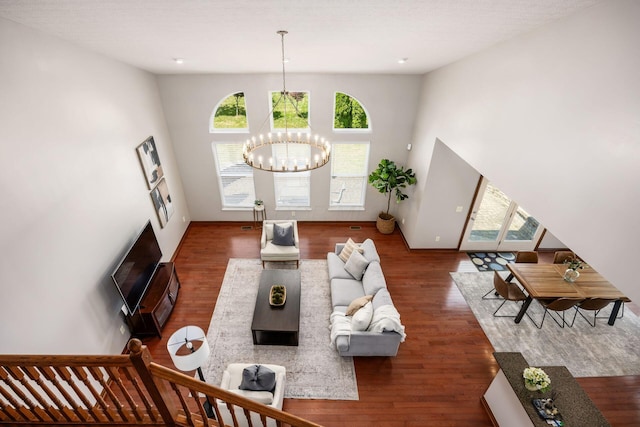 6923 Bishops Crossing Cir, Dublin, OH 43016 - living room featuring a chandelier and wood finished floors