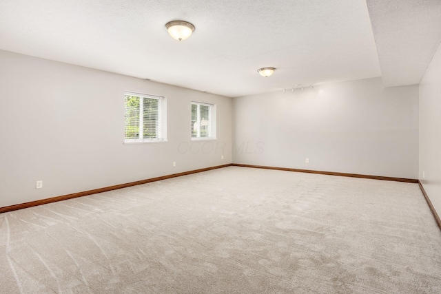 6923 Bishops Crossing Cir, Dublin, OH 43016 - carpeted spare room featuring a textured ceiling