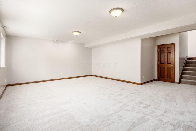 6923 Bishops Crossing Cir, Dublin, OH 43016 - finished basement with stairs and light colored carpet